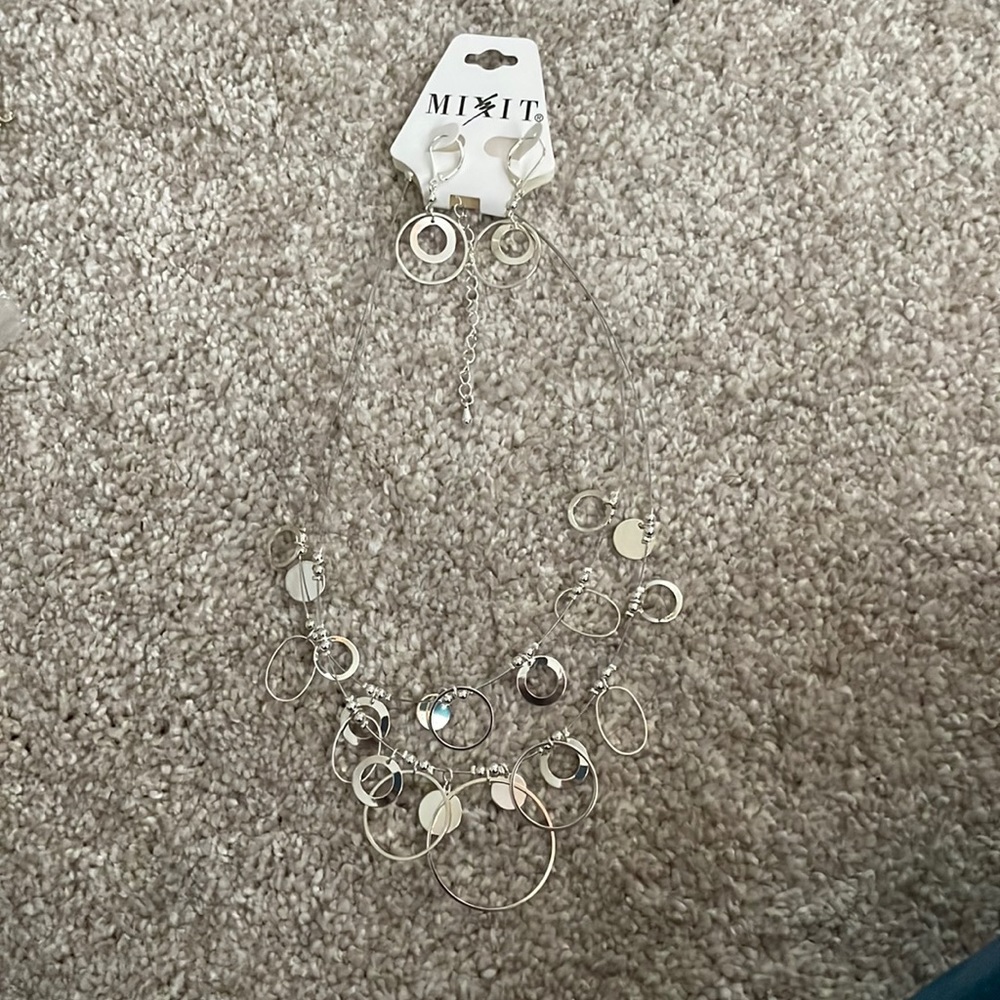 Silver necklace and earrings